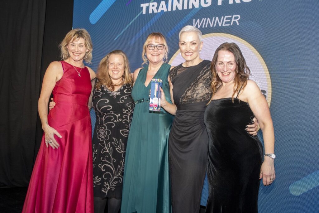 Business Solutions colleagues with their award