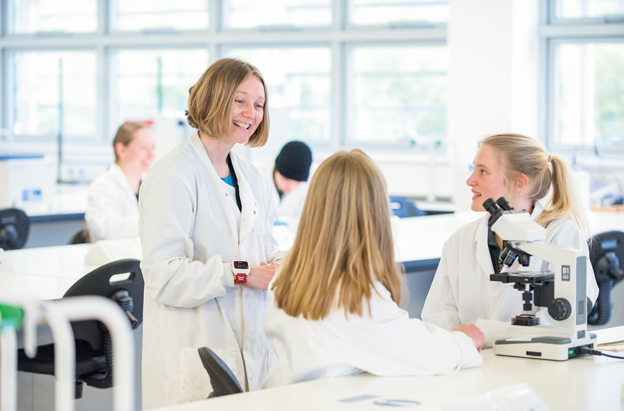 Students and a lecturer in a laboratory